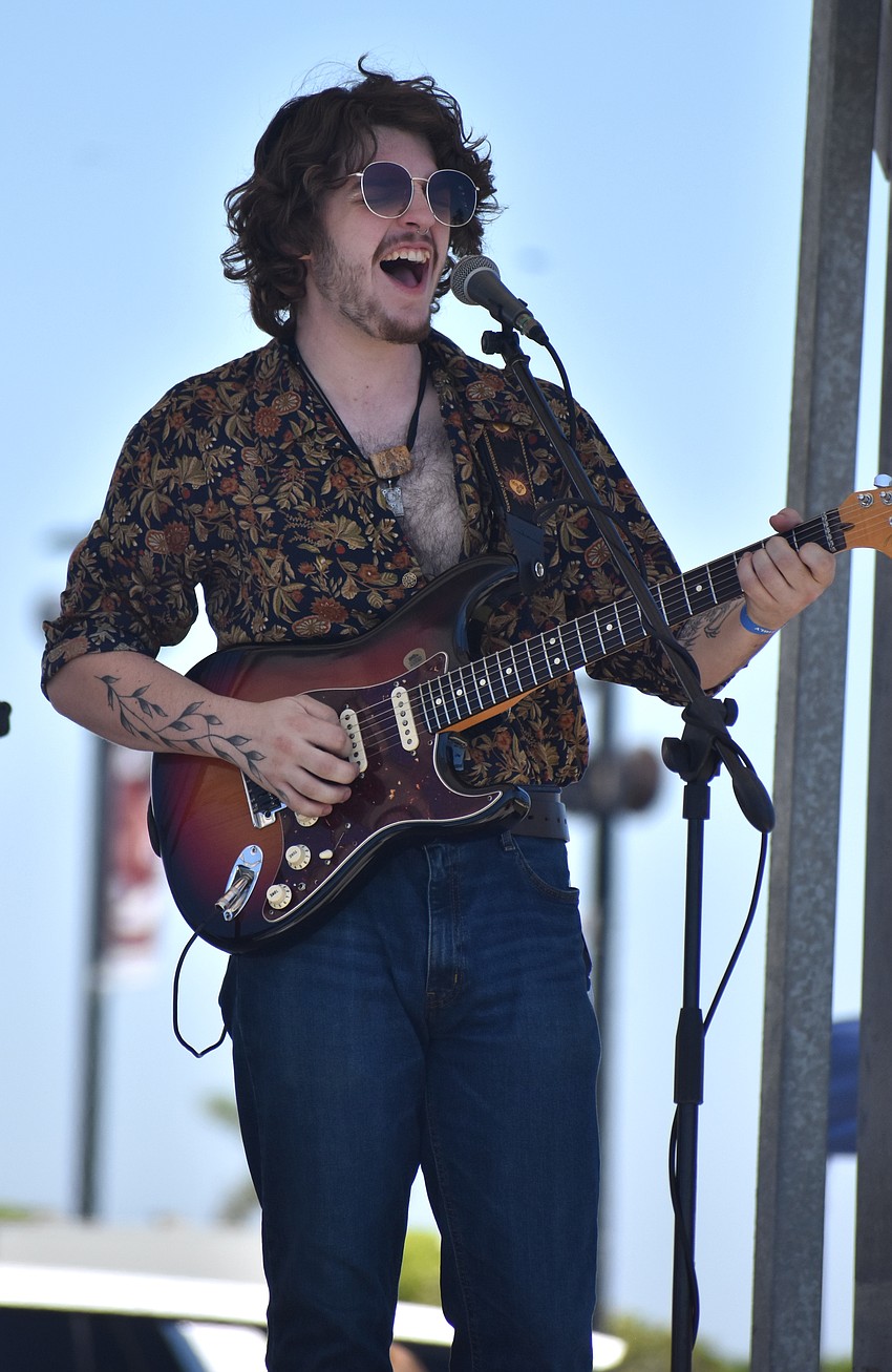 Gannon Torrella plays guitar at My Hometown Fest for Sweet Fleet and Hell on Heels at My Hometown Fest on March 21.