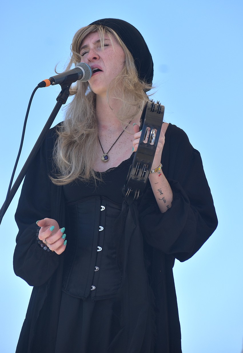 Alexa Murphy sings the lead for Sweet Fleet, a Fleetwood Mac cover band, at My Hometown Fest on March 21.