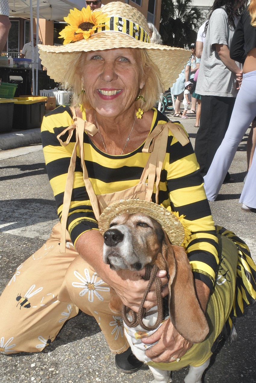 Cathy Borroughs and Ruby of Suncoast Basset Rescue wore matching outfits.