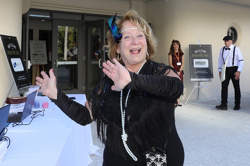 Linda Finnerty solo dances during registration.