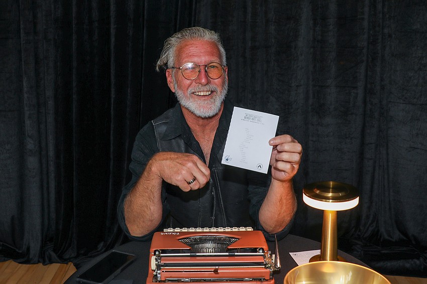 Steve McAllister types poems on demand at the Beaux Arts Ball.