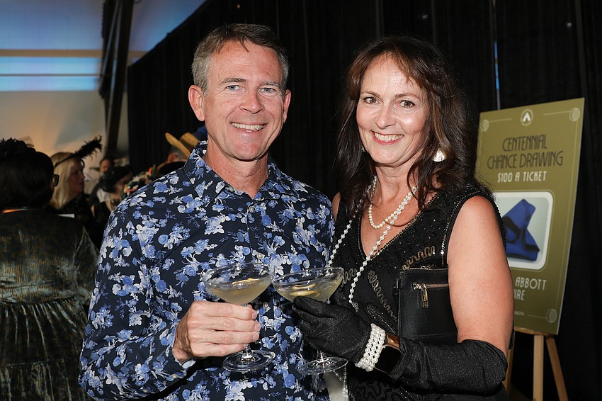 Tod and Rebecca Abrahamson toast to good times.
