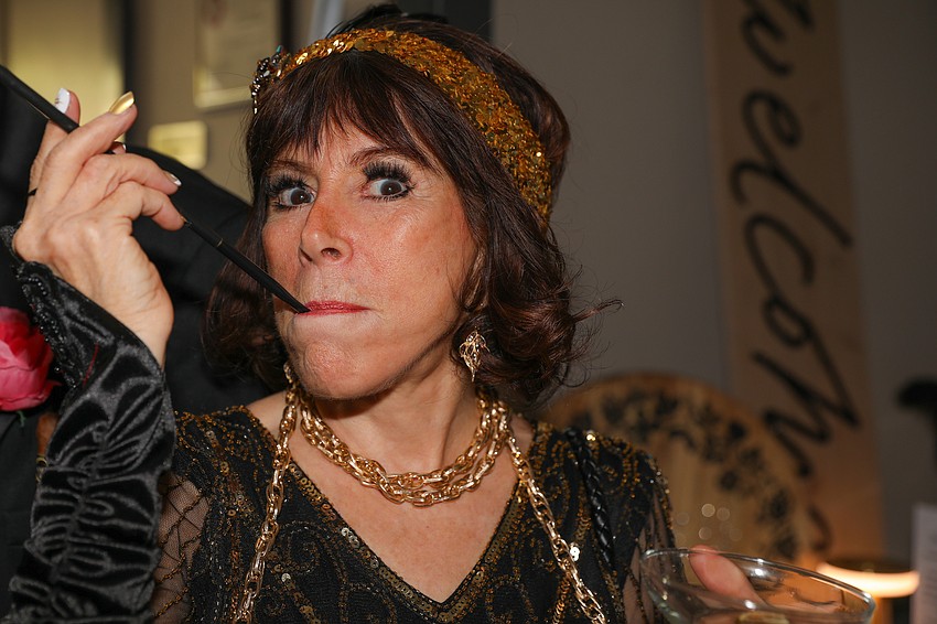 Robin Kasowitz takes a puff.