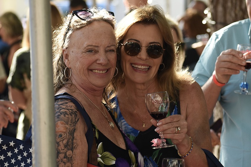 Wendy Gilmour and Gail Brewer enjoy wines and each other's company.