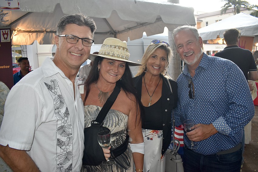 Chuck Pue, Kelley Hannan, Lynn Hagen and Alex Chater enjoy the festival.