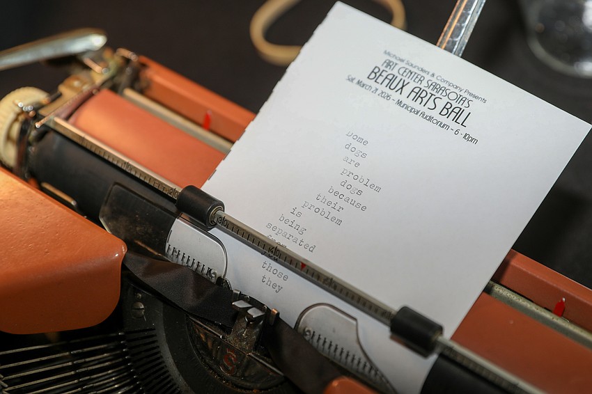 Steve McAllister creates poems on demand during the Beaux Arts Ball.