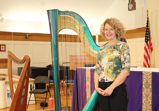 Tasha Robinson has played the harp for 35 years. On St. Patrick's Day, she performed with two of her instruments at All Angels by the Sea Episcopal Church before attendees enjoyed an Irish-themed holiday dinner.