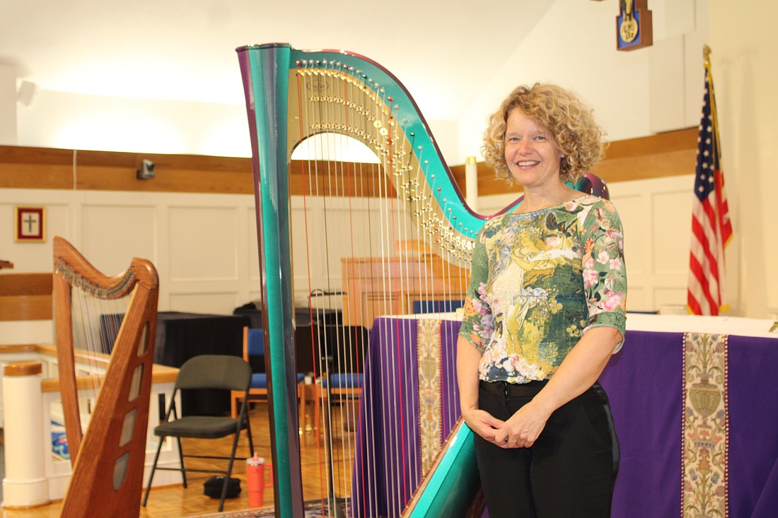 Tasha Robinson has played the harp for 35 years. On St. Patrick's Day, she performed with two of her instruments at All Angels by the Sea Episcopal Church before attendees enjoyed an Irish-themed holiday dinner.
