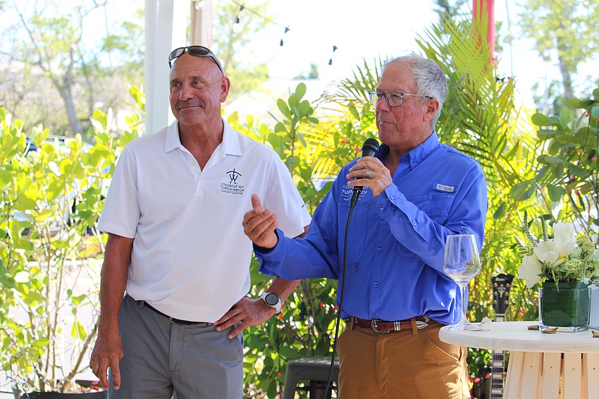 Longboat Key Turtle Watch President Jeff Driver and board member Tim Thurman thank attendees of Cathy Ann 
