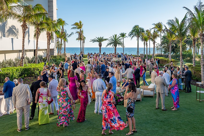 Cocktail hour in the courtyard begins.