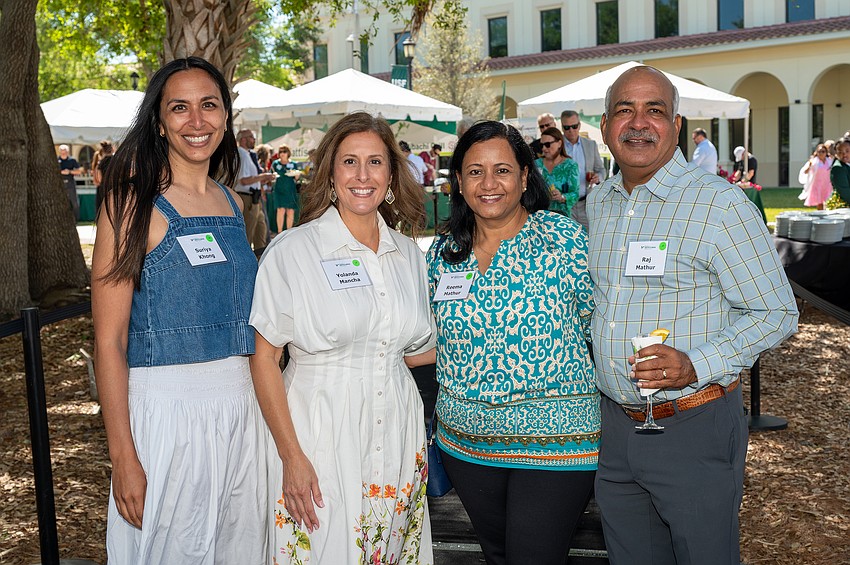 Suriya Khong and Yolanda Mancha with Reema and Raj Mathur