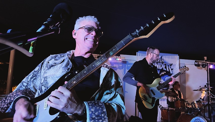 Lakewood Ranch's Chuck Black rocks out during a gig with Silver Thunder.
