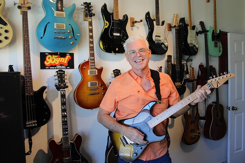 As a teenager, Summerfield's Chuck Black became obsessed with guitars, as a wall of his home would indicate.