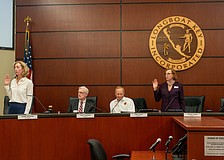 Debra Williams (standing left) and Penny Gold (standing right) were picked as mayor and vice mayor, respectively, at Longboat Key’s Town Commission meeting Monday, March 23.