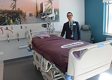 Philip Reber, the acting CEO at Lakewood Ranch Medical Center, stands in one of the 60 new rooms of the hospital's 170,000-square-foot tower expansion.