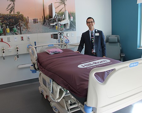 Philip Reber, the acting CEO at Lakewood Ranch Medical Center, stands in one of the 60 new rooms of the hospital's 170,000-square-foot tower expansion.