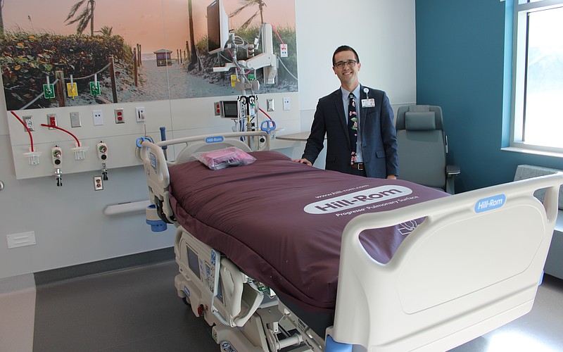 Philip Reber, the acting CEO at Lakewood Ranch Medical Center, stands in one of the 60 new rooms of the hospital's 170,000-square-foot tower expansion.