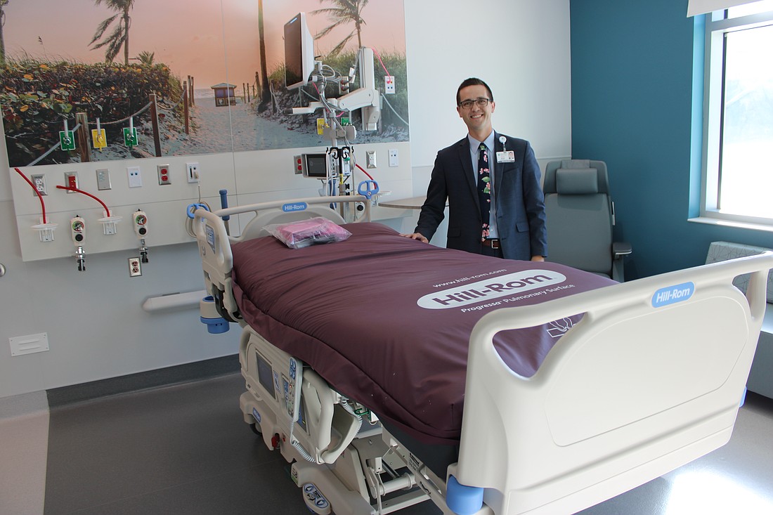 Philip Reber, the acting CEO at Lakewood Ranch Medical Center, stands in one of the 60 new rooms of the hospital's 170,000-square-foot tower expansion.