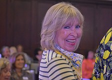 Pam Yulke, modeling an outfit by J. McLaughlin at the "Lights, Camera, Legacy" fashion show, is a past president and has been in the University Park Women's Club for 23 years.