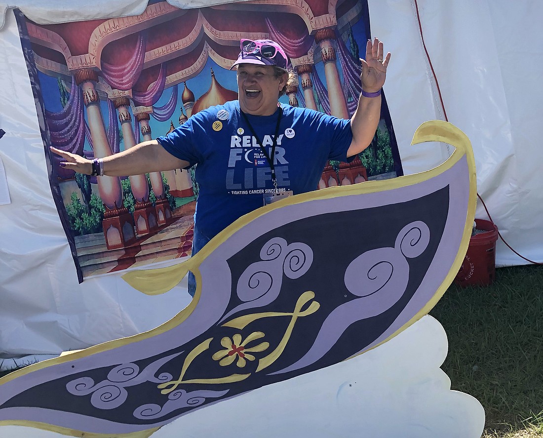 Yamile Rivera walks at Relay for Life of Lake Buena Vista in honor of her mother.