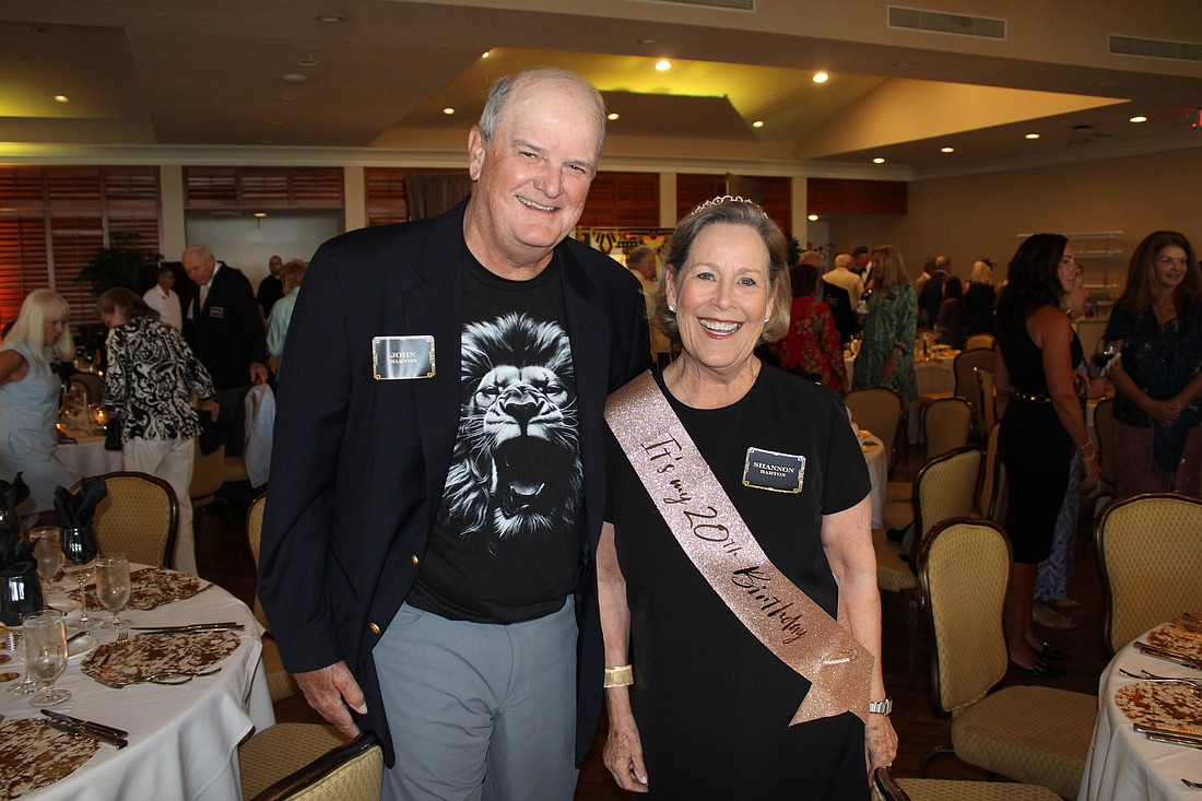 Together, John and Shannon Barton make the "Roaring '20s" at the Great Gatsby-themed annual dinner for members of the Friars Club. Attendees shared their favorite memories from the season and gave out awards at the March 24 celebration at the Harbourside Ballroom.