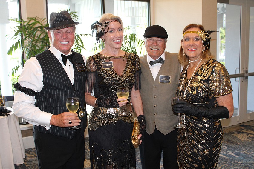 David Glorius, Kimberley Pelyk, Mike St. Hilaire and Beverly St. Hilaire dress to impress at the Roaring '20s-themed Friars Club dinner.