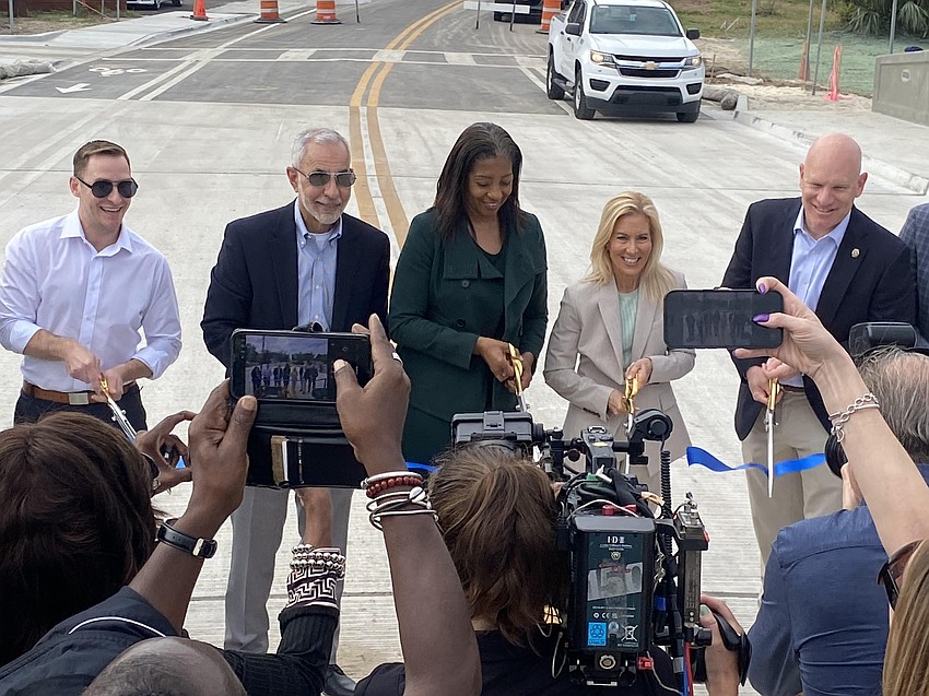 Attendees at the March 26 ceremonial opening of the Stockton Street bridge over McCoys Creek included, from left, Jacksonville City Council members Jimmy Peluso, Ron Salem and Tyrona Clark-Murray, Mayor Donna Deegan and Council Vice President Nick Howland. Others on hand included Council members Rahman Johnson and Chris Miller.