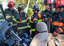 Longboat Key firefighter paramedics used the Hurst Jaws of Life ram to push the dashboard of a Ford Focus away from the passenger seat.