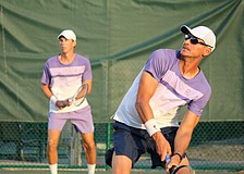 Tennis pros Robert Jendelund and Tomasz Borucki face off in a doubles match against Jhonathan Gonzalez and David Pfister at the Longboat Key Tennis Center's end-of-season party March 25.