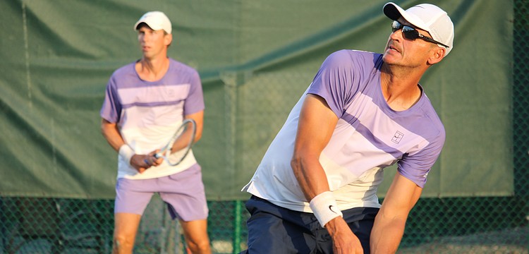 Tennis pros Robert Jendelund and Tomasz Borucki face off in a doubles match against Jhonathan Gonzalez and David Pfister at the Longboat Key Tennis Center's end-of-season party March 25.