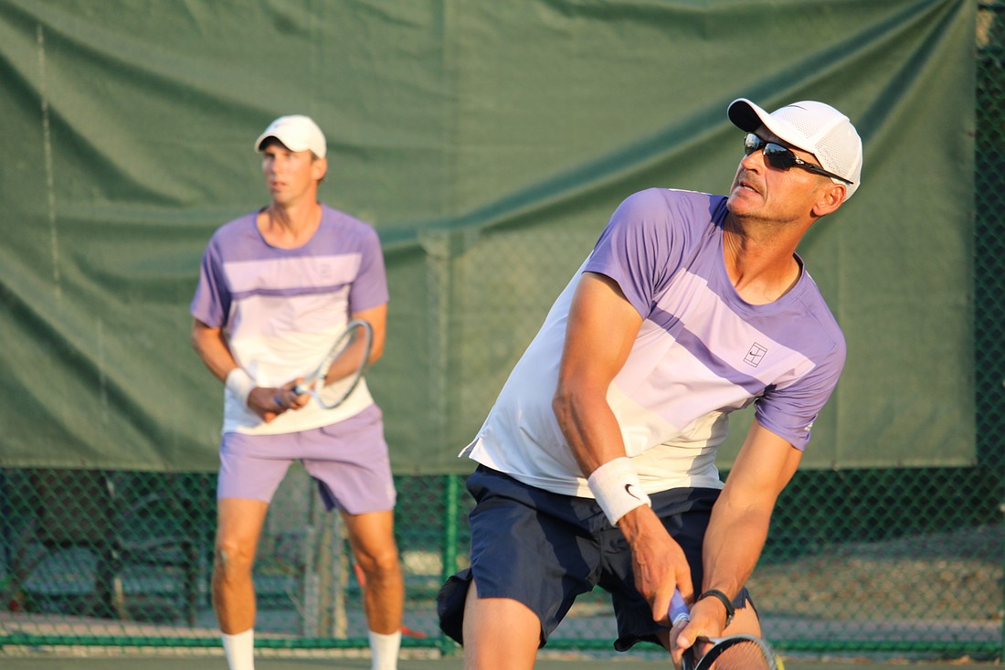 Tennis pros Robert Jendelund and Tomasz Borucki face off in a doubles match against Jhonathan Gonzalez and David Pfister at the Longboat Key Tennis Center's end-of-season party March 25.