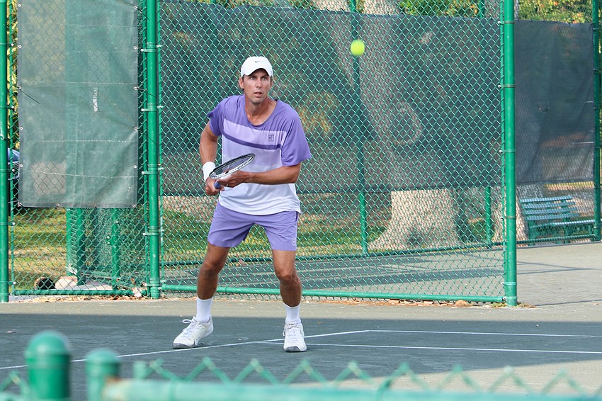 Robert Jendelund stares down the ball during a doubles match.