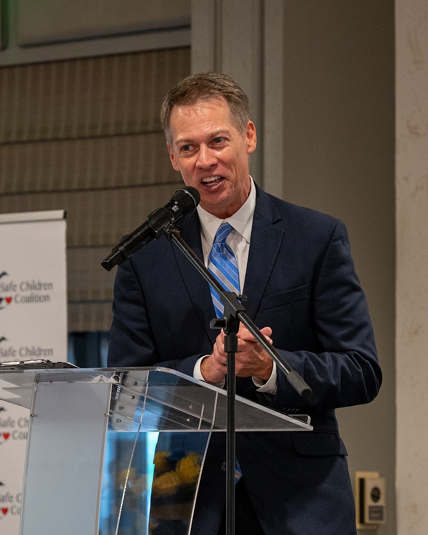 Joe Girvan emcees the morning.