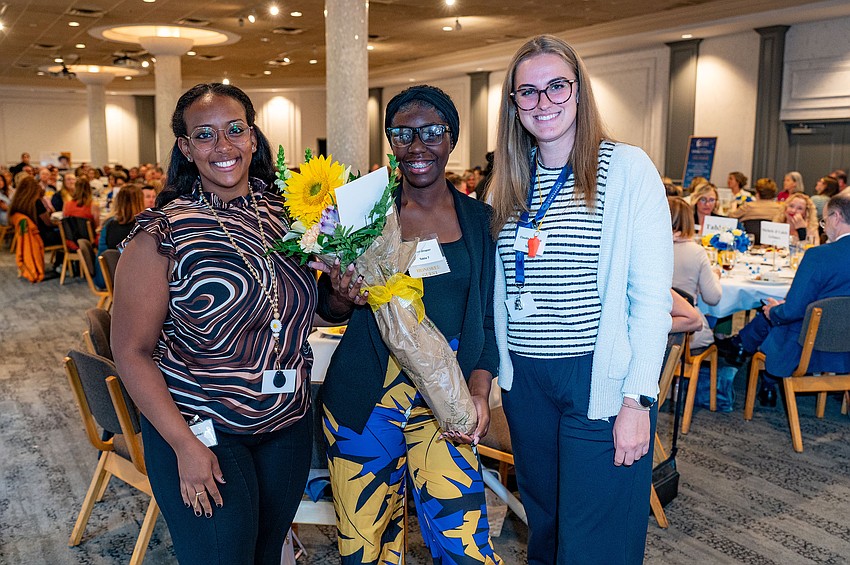 Betty Mehardi, honored guest Aiyana Draper and Claudia Sbaschnik