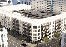 The expansion of McCown Towers would surround the parking structure that would include 160 public parking spaces owned by the city.