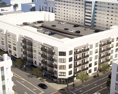 The expansion of McCown Towers would surround the parking structure that would include 160 public parking spaces owned by the city.