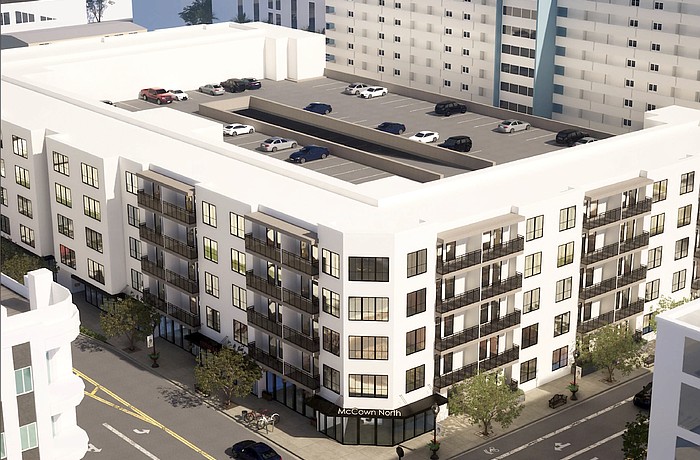 The expansion of McCown Towers would surround the parking structure that would include 160 public parking spaces owned by the city.