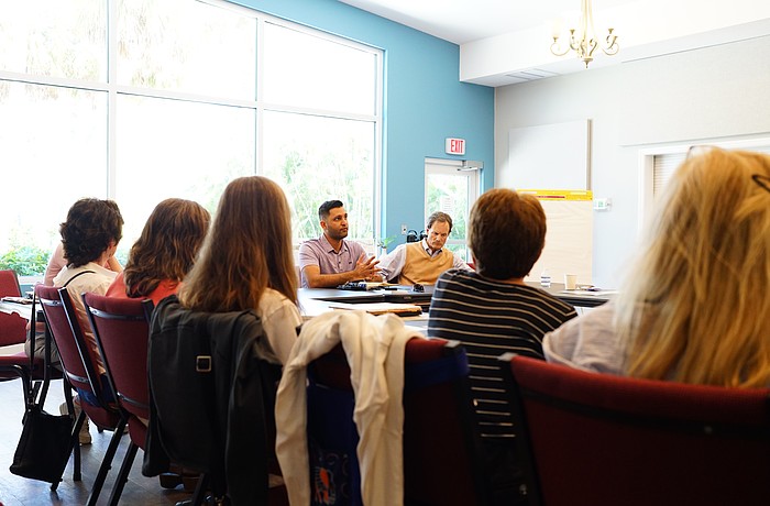 Manatee County Commission Chair Tal Siddique speaks with community group Longboat North at Longboat Island Chapel Thursday, March 19.