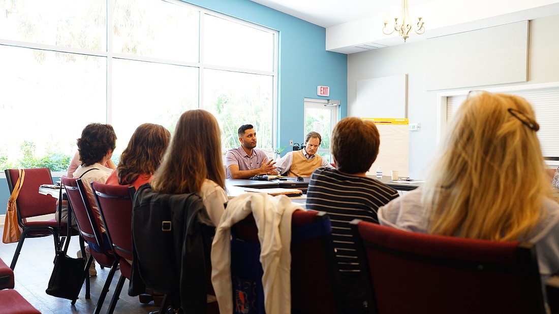 Manatee County Commission Chair Tal Siddique speaks with community group Longboat North at Longboat Island Chapel Thursday, March 19.