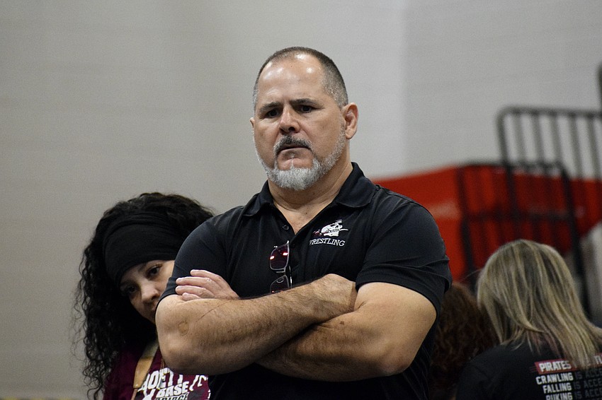 Cezar Sharbono, the Braden River High wrestling coach, doesn't believe him or his assistants will benefit from SB 538, since booster club support for his program has historically been low.