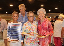 Sue Wertman and Ann Quackenbush join their sister-in-law, Molly Quackenbush, in enjoying a pancake breakfast fundraiser hosted by the Kiwanis Club of Longboat Key. Chris Sachs and fellow Kiwanians volunteers to raise support for Family Promise of Sarasota-Manatee.