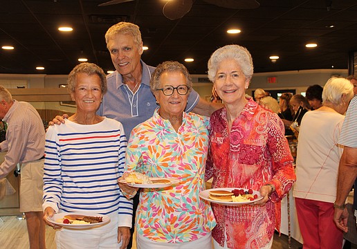 Sue Wertman and Ann Quackenbush join their sister-in-law, Molly Quackenbush, in enjoying a pancake breakfast fundraiser hosted by the Kiwanis Club of Longboat Key. Chris Sachs and fellow Kiwanians volunteers to raise support for Family Promise of Sarasota-Manatee.