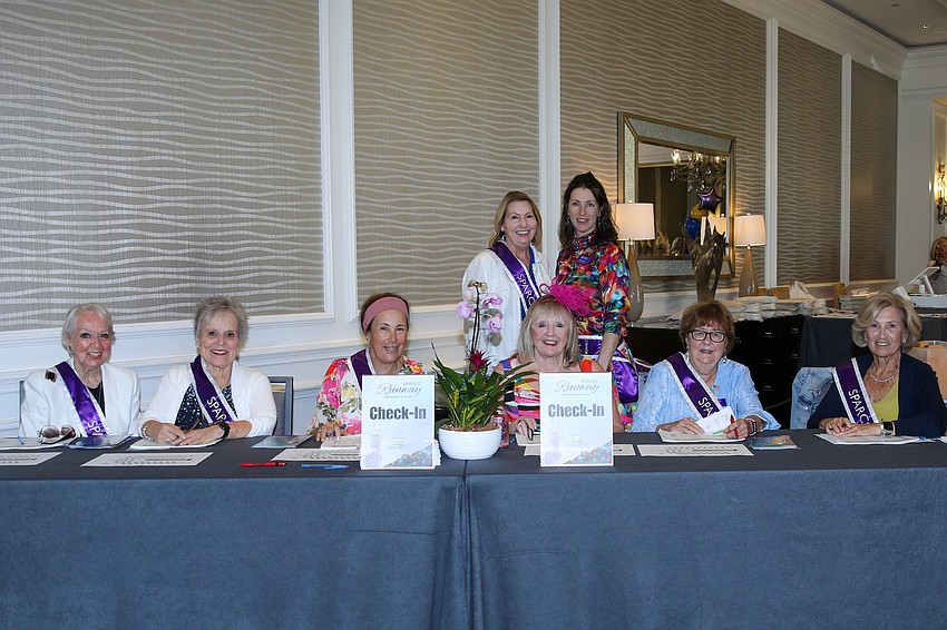The volunteers are ready to register 650 guests for the much anticipated SPARCC Runway Fashion Show.