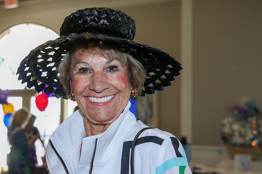 Terry Brennan-Davis is ready for a kaleidoscope of colors during the luncheon.