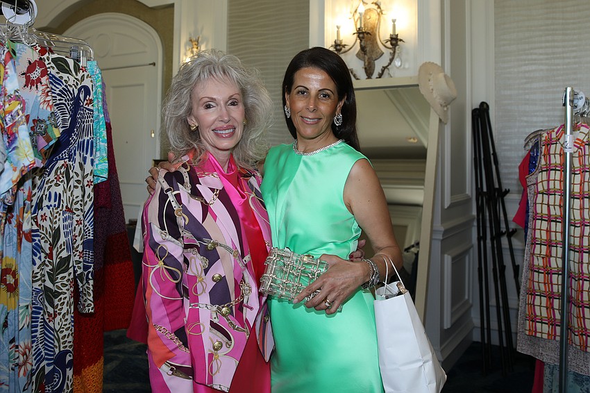 Louise Ginsberg and Malika Apple partake in shopping at the SPARCC Runway.