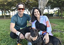 Kellen Dorsch and his wife Alanna Giuliani sit with Velly.