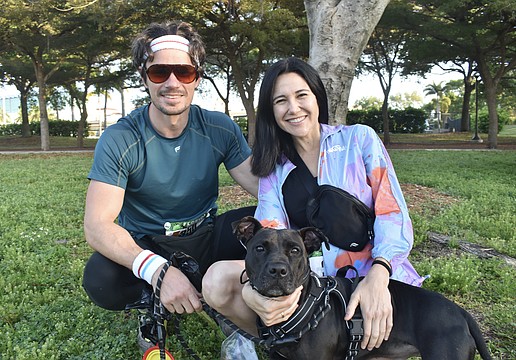 Kellen Dorsch and his wife Alanna Giuliani sit with Velly.
