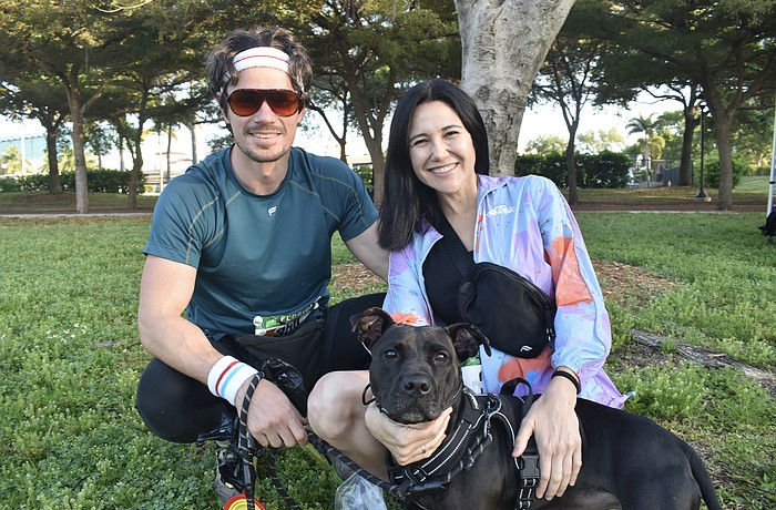 Kellen Dorsch and his wife Alanna Giuliani sit with Velly.