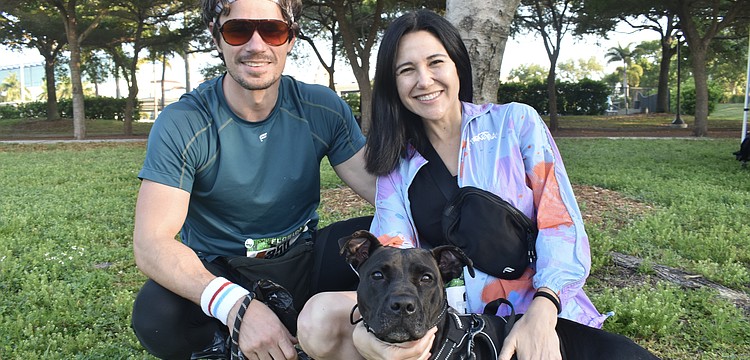 Kellen Dorsch and his wife Alanna Giuliani sit with Velly.