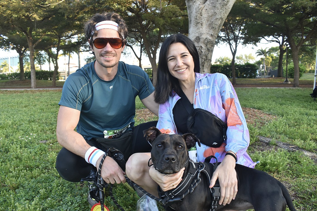 Kellen Dorsch and his wife Alanna Giuliani sit with Velly.